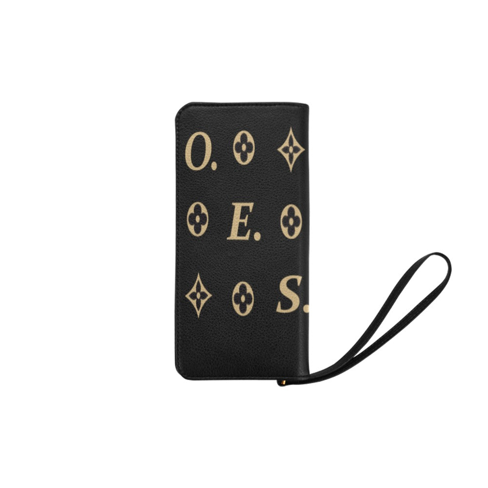 A black faux leather wristlet wallet with gold-tone Eastern Star initials and symbols.