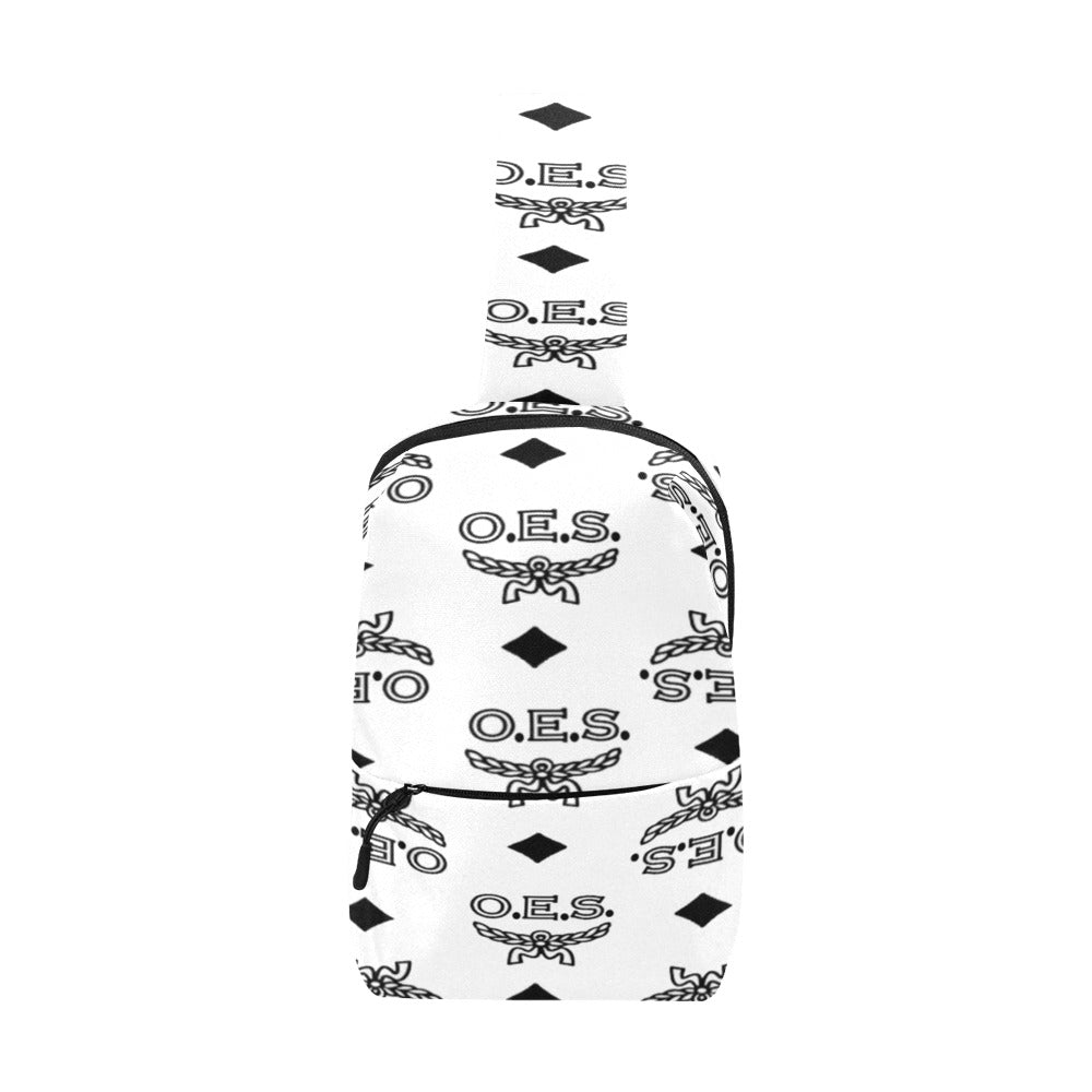 White bag with black geometric patterns and 'O.E.S.' text on a white background