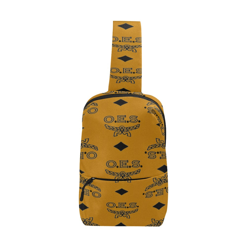 Yellow crossbody bag with black pattern on a white background