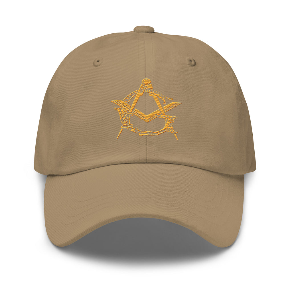 Brown cap with yellow embroidered design on a white background